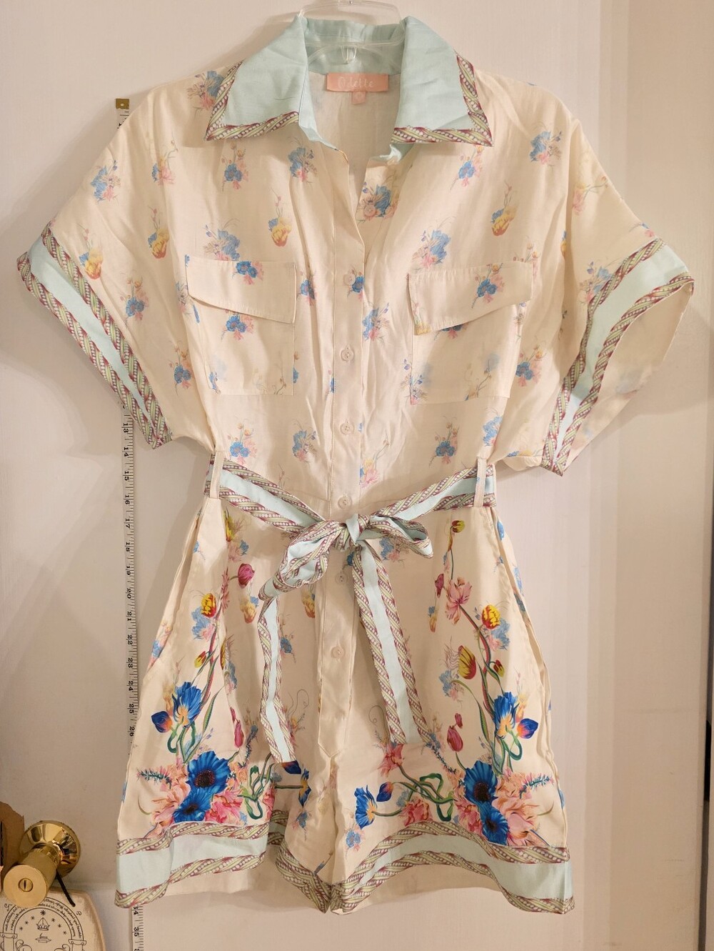 Odette Boutique Cream Floral Button-Up Romper with Mint Trim